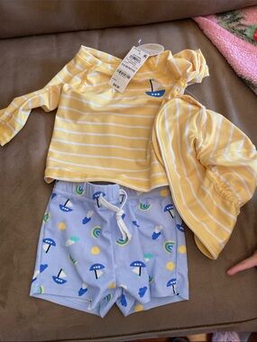 NWT! First impressions. Baby boy swim suit set and hat
